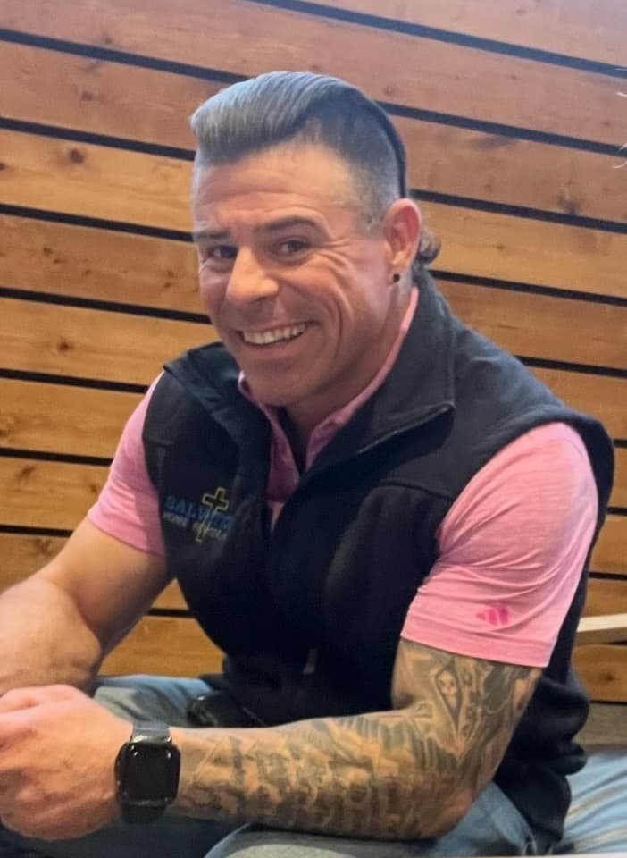 Chris Sibley, founder of Job Cost Pro, in his Salvation Home Remodeling shirt